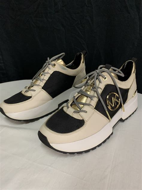 cosmic trainer michael kors|Cosmo Canvas and Leather Trainer .